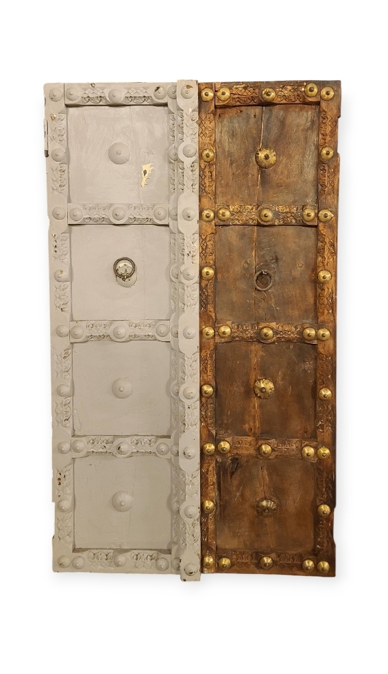 Professional paint stripping of a wooden door in Liverpool, removing old layers to restore natural wood