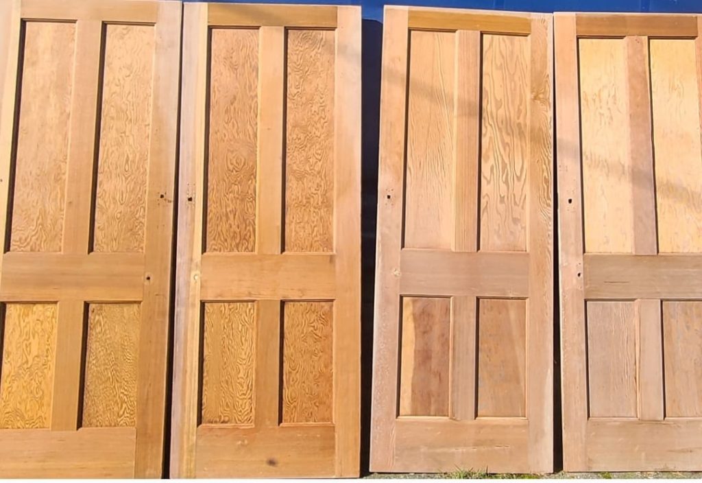 Professional paint stripping of a wooden door in Telford, removing old layers to restore natural wood